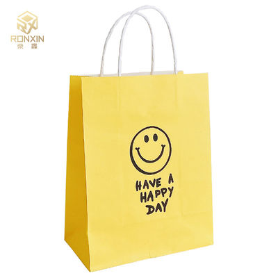 26cm Height Coated Yellow Paper Gift Bags Reusable With Smile Face